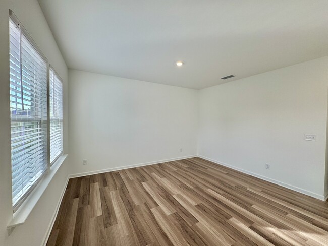 Building Photo - Be the first to live in this spacious bran...