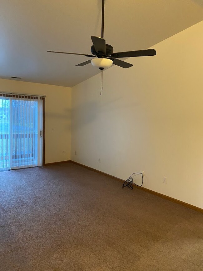 Family room with balcony entrance - 7481 Crosscreek Dr