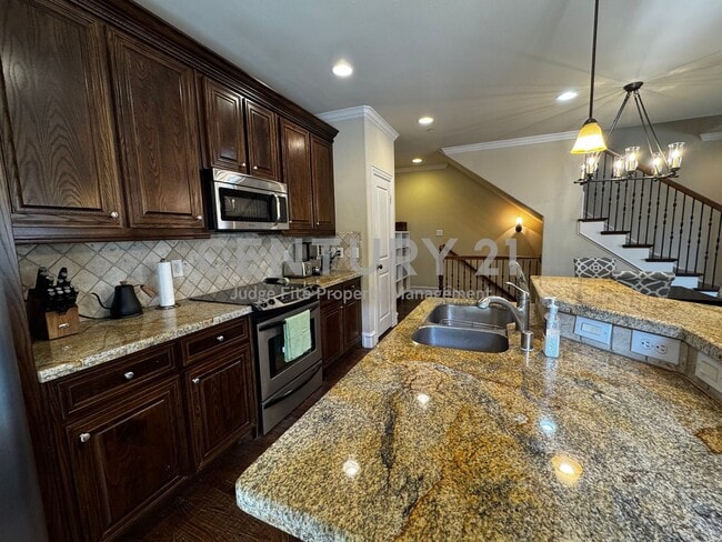 Building Photo - Sophisticated 2/2.5/2 Condo In Gated Commu...