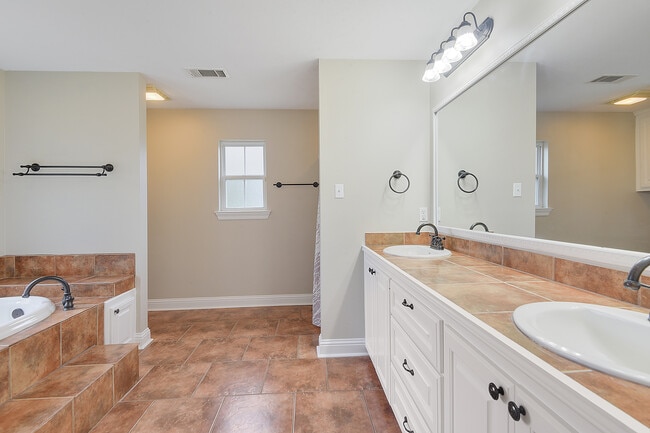 master bath with separate shower and tub - 14062 Bourque Rd