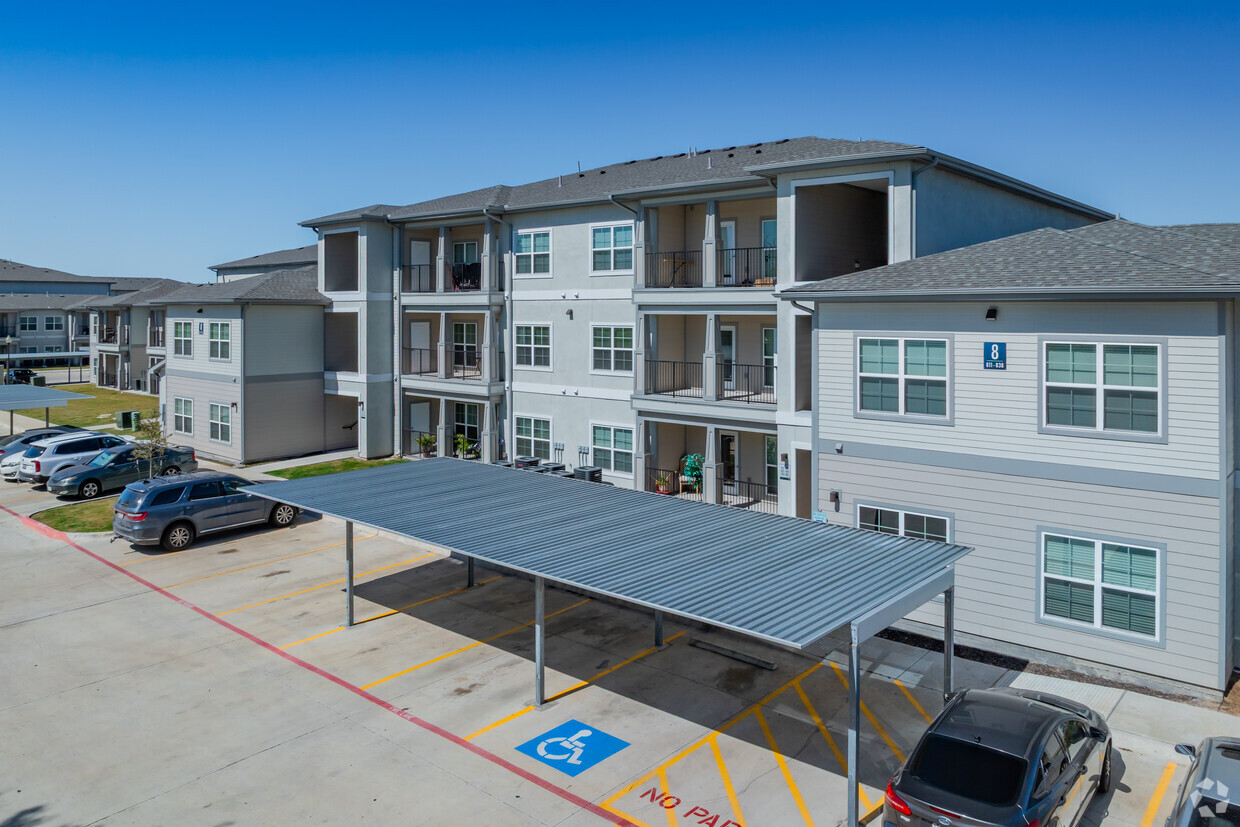 Building Photo - Enchanted Gardens Apartments