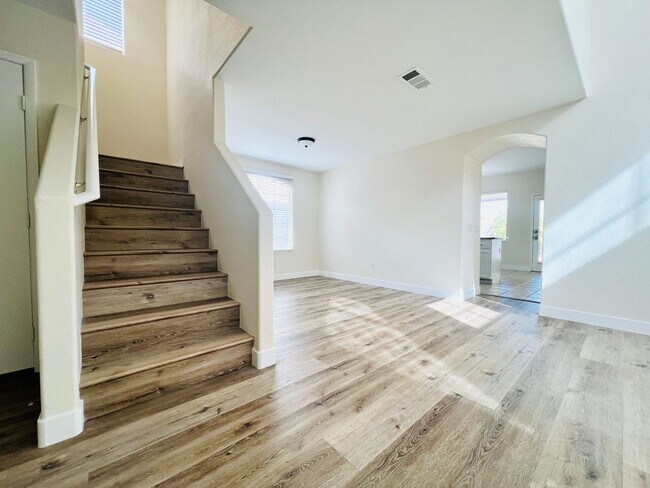Building Photo - REMODELED, SPACIOUS, 4 BEDROOM HOME WITH VAULTED CEILINGS AND LOFT