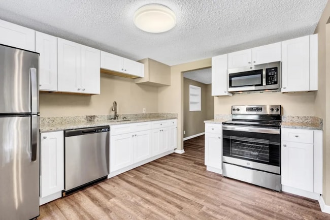 Building Photo - 6969 Delisle Dr