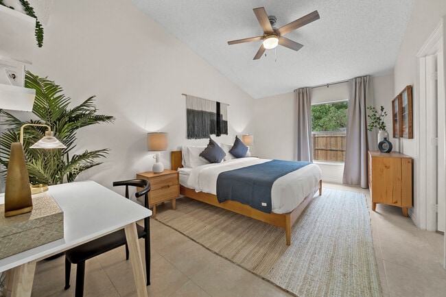 Dream sweetly in the roomy King-size bedroom with new memory foam mattress, desk, and blackout drape - 2234 Justin Ave