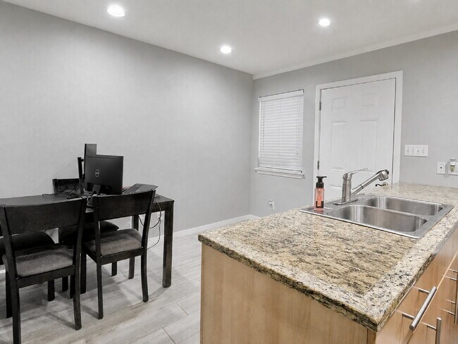 Building Photo - Updated North Austin Townhome with Exceptional Outdoor Space