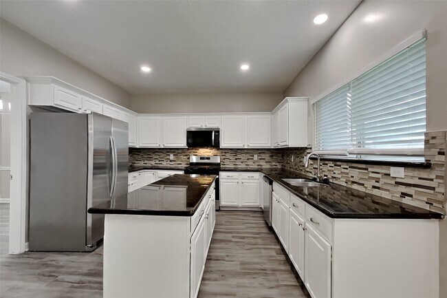 Foto del edificio - 16306 Ash Point Ln