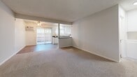 Located at 450 N Armando St in Anaheim, CA, this single-story, one-bedroom, one-bathroom residence offers a practical and well-organized layout. The open-plan living, dining, and kitchen area serves as the heart of the home, featuring durable wood-style flooring, a ceiling fan, and large sliding glass doors fitted with vertical blinds that lead to a private patio and invite natural light throughout. The kitchen is well-appointed with crisp white cabinetry, dark granite-style countertops, a gas range, dishwasher, double-basin sink, and an adjacent walk-in pantry offering generous storage. A pass-through counter connects the kitchen to the dining and living areas, enhancing the sense of openness. The carpeted bedroom is a comfortable retreat, featuring a large double sliding-door closet, a window with natural light, and access to a second closet. The bathroom includes a full shower-tub combination and wood-style flooring that mirrors the main living areas. A textured ceiling runs throughout the home, adding subtle architectural character. The hallway connects the main living spaces to the bedroom and bathroom, while a dedicated entrance provides a welcoming transition into the home. The private patio completes this functional and well-designed residence.