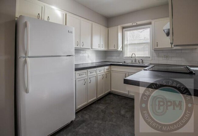 Building Photo - Spacious 5 Bedroom / 2.5 Bathroom Home | Near Ralston