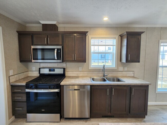 Building Photo - 5695 Windjammer Ct