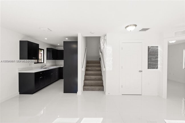 Photo - 2243 Northwest 50th Street, Miami, FL 33142 - 3 BR 2.5 BA multi-family home