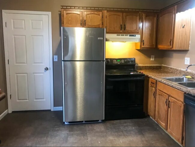 Foto del edificio - 5516 NW Cimarron Dr