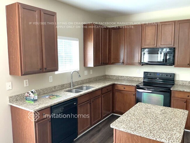 Foto del edificio - 7112 Bear Grass Ln