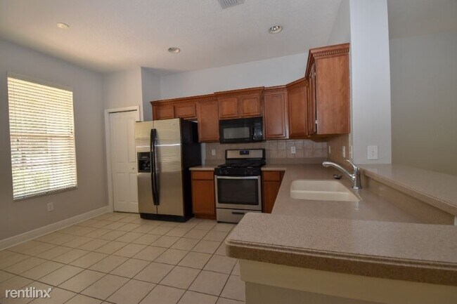 Building Photo - 4 br, 3 bath Townhome - 14533 Cotswolds Dr