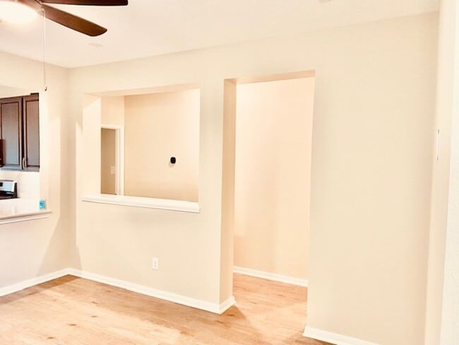 Building Photo - Willow Wood community features a brick ele...