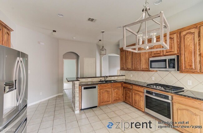 Building Photo - 4 br, 2 bath House - 13713 Badger Creek Dr...