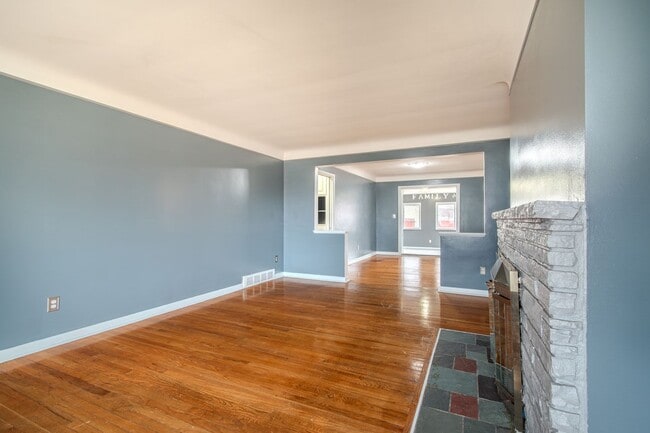 Building Photo - Generous Living on a Quiet Street, 4BR Brick Home with 2-Car Garage