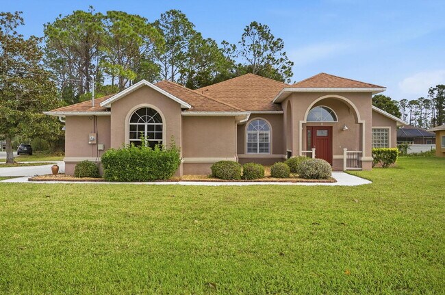 Building Photo - "Charming 3-Bedroom Home with 2 Full Baths and 2032 Sq Ft of Comfort in Palm Coast!"