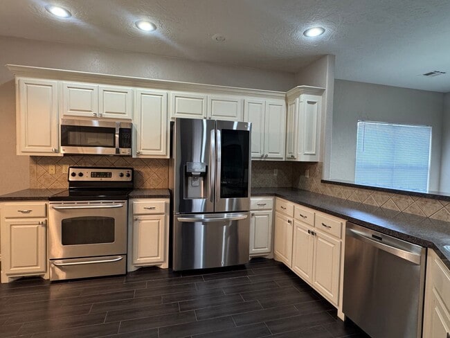 Building Photo - 4413 NW Wolfcreek Blvd