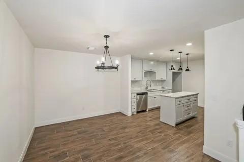 Building Photo - 7609 Woodford Ave