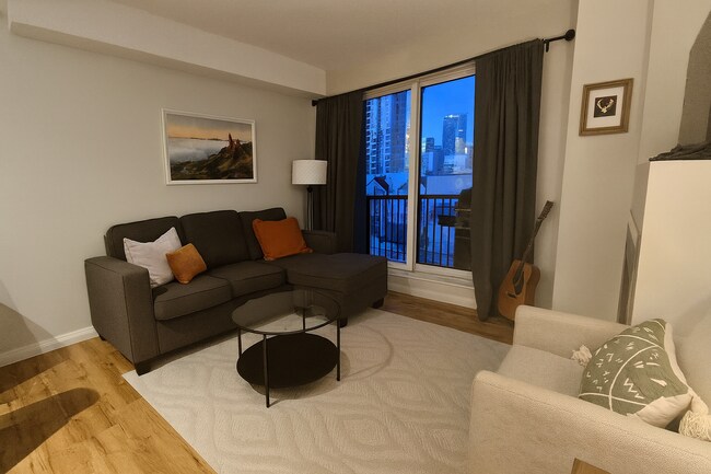 Photo du bâtiment - Victoria Park - 1 Bedroom + Den Condo Available January 15th