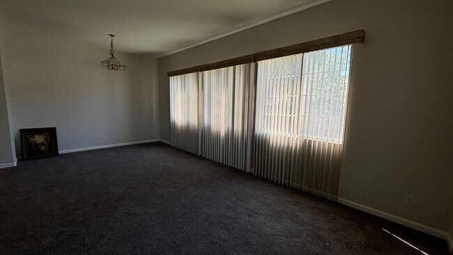 Building Photo - Adorable Four Bedroom home ready for its f...