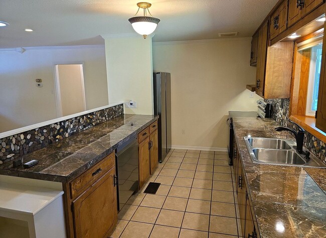 Building Photo - Move-In Ready!! 4 Bed, 2 Bath - LAWN CARE ...