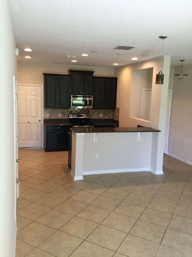 Building Photo - 3 br, 2.5 bath House - 211 WINDFLOWER WAY