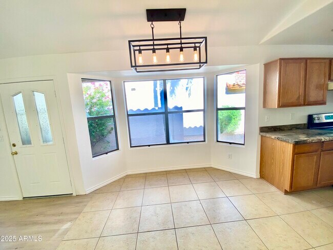 Building Photo - 8884 E Aster Dr