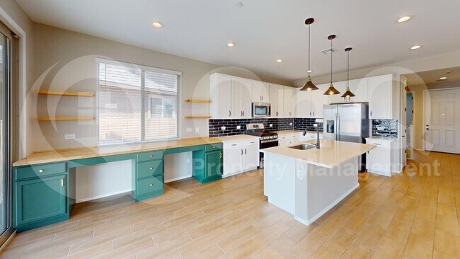 Foto del edificio - 10587 W Chadwick Dr