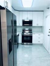 Building Photo - 10185 Collins Ave