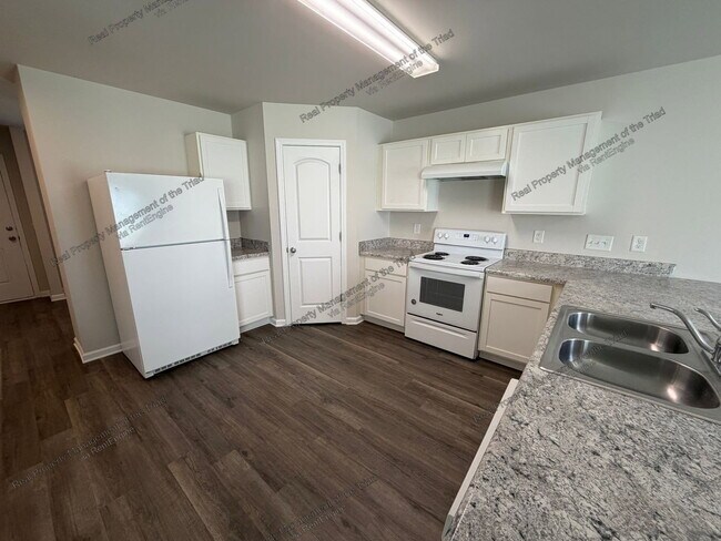 Foto del edificio - 4116 Devonwood Ct