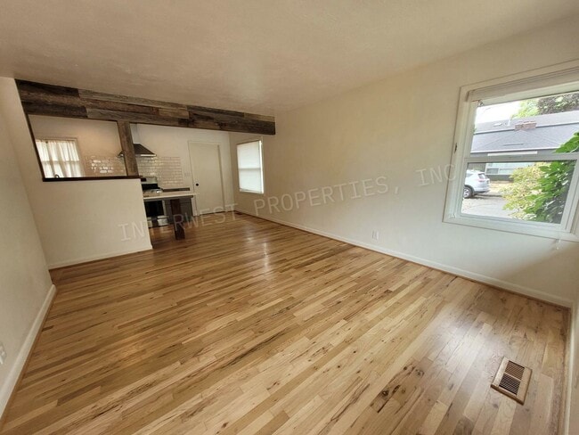 Building Photo - Beautiful 3 bdrm Home w/ a remodeled kitchen, stainless appliances, deck, yard and more!!!