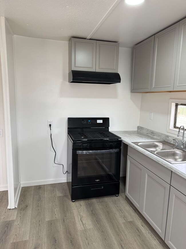 Building Photo - **Now Available!! Stevinson Mobile Home