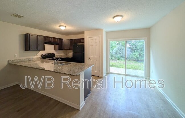 Building Photo - 7824 Playschool Ln