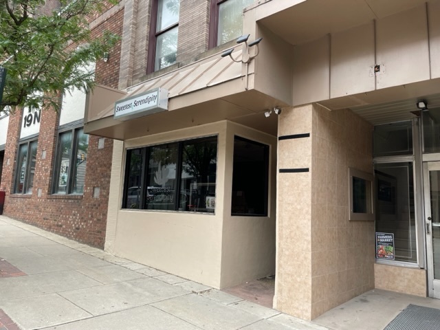 Center entrance to upper floors - 31 N Main St