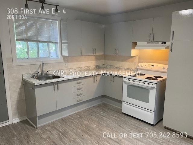 Building Photo - Two Bedroom Apartment Secure Building