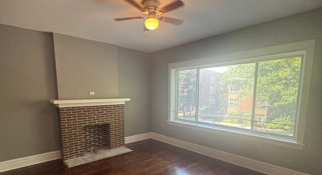 Building Photo - 7827 S Colfax Ave