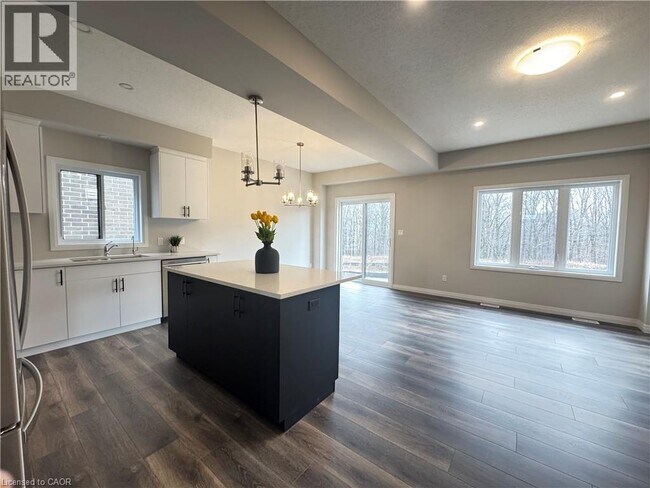 Photo du bâtiment - 113 Rivergreen Cres