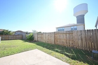 Building Photo - 9403 Coatsworth Dr