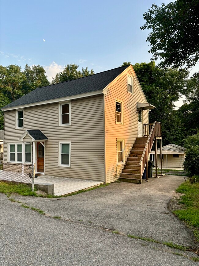 Exterior w/ driveway & unit entry - 34-2 Savoy Ave