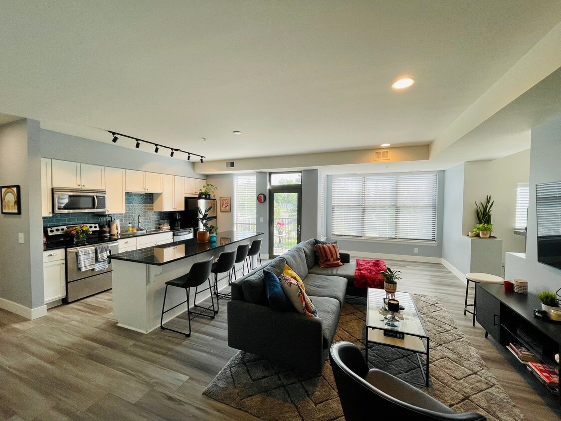Open concept living room, kitchen, dining area, etc - 4500 Chicago Ave