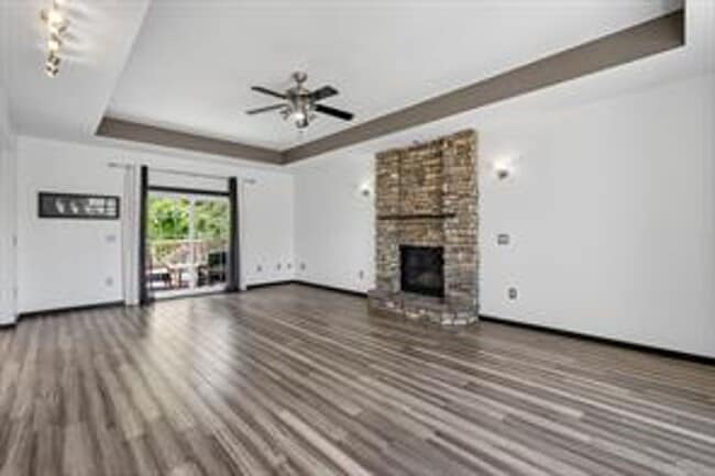 Building Photo - Spacious 5-Bed Walkout Home with Over 3,50...