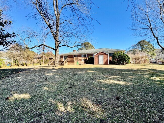 Building Photo - Available NOW! Lakefront 4 Bedroom/2 Bath Home, Pet-Friendly, Fenced Yard, Great School Zones!