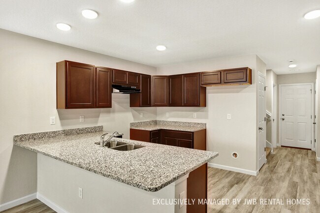 Building Photo - 8518 McGirts Village Ln