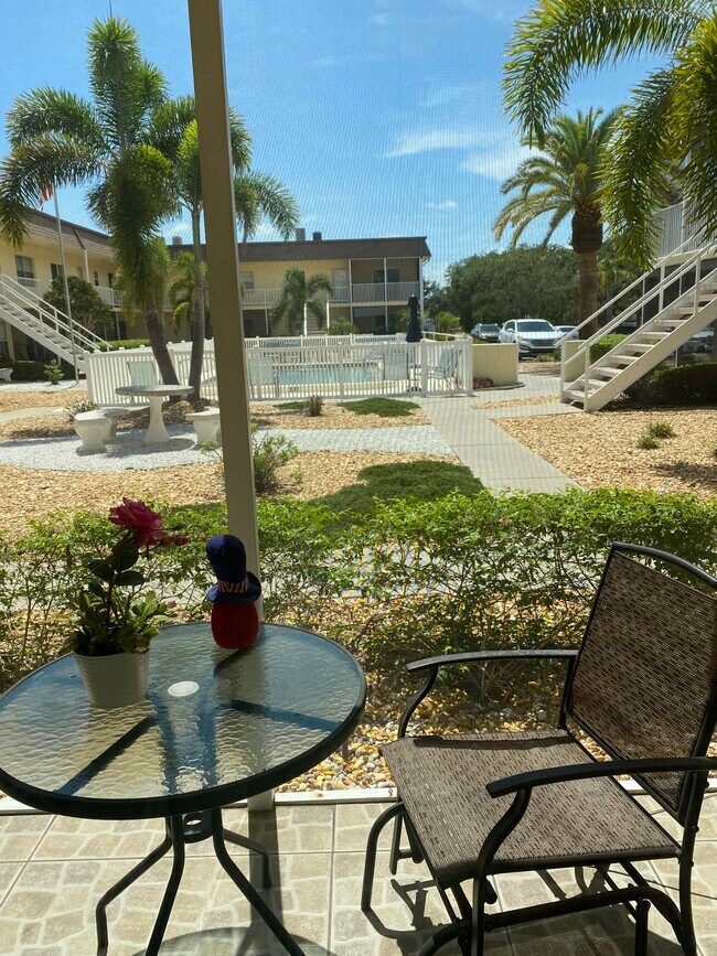 Lanai view of pool - 409 Manatee Ct