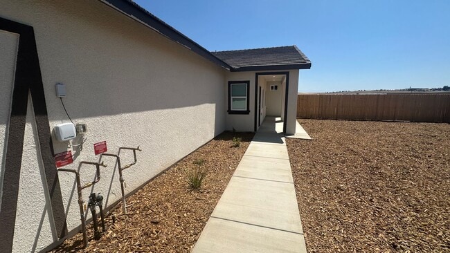 Building Photo - Coyote Run Duplexes 9004
