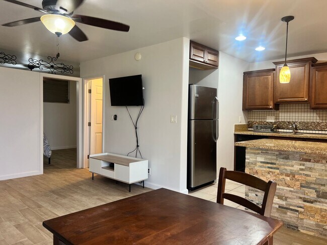 Building Photo - One bedroom semi-furnished bottom floor condo