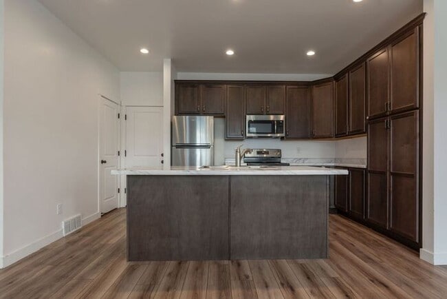 Photo - Beautiful Row End Townhouse w 2 car attached