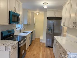 Foto del edificio - 208-40 15th Dr