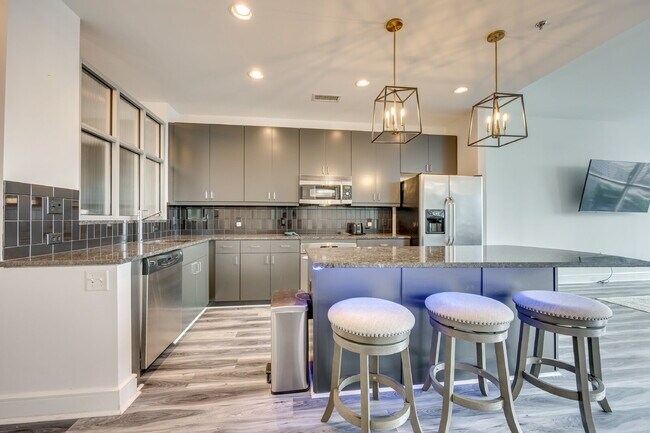 Photo - 307 W Trade St Apartment